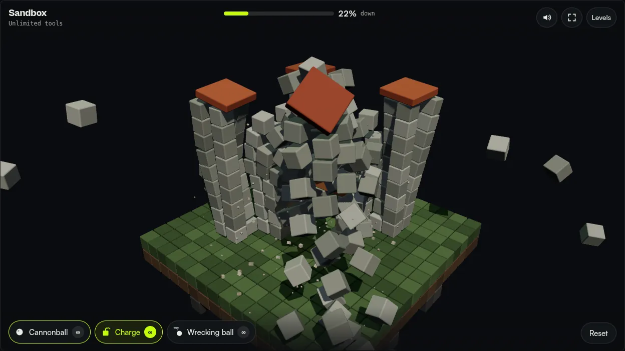 Screenshot of Rubble: four charges going off at the base of a stone castle keep, with blocks thrown out across the island