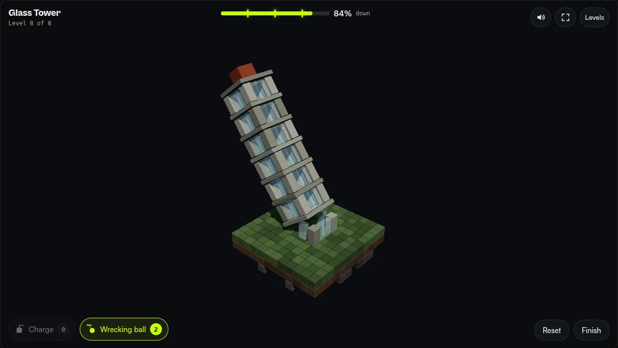 Screenshot of Rubble: the Glass Tower leaning over after two charges at its base, with the meter at 84 percent